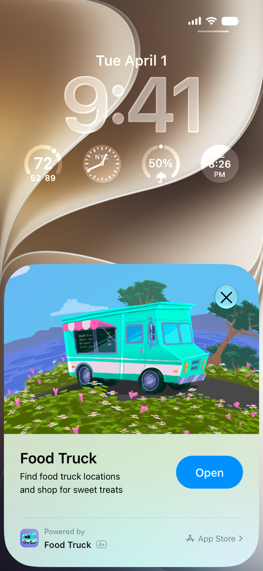 A screenshot of an iPhone Lock Screen. The bottom half of the screen shows the App Clip card for a food truck’s App Clip as it appears when the person invokes the App Clip.