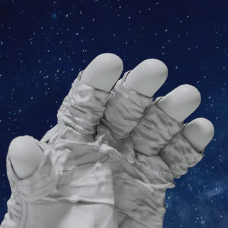 An image of a person's open hand wearing a bulky space suit glove, shown from the person's perspective. The palm faces upward, and no button appears above it. The image background shows a starry sky in a fully immersive space.