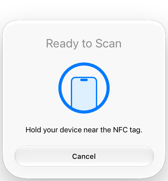 An illustration of a scanning sheet on iPhone, which includes the text Ready to Scan and Hold your device near the NFC tag, and a Cancel button.