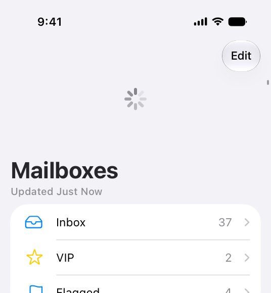 A screenshot of a refresh content control spinning while Mail checks for new messages.