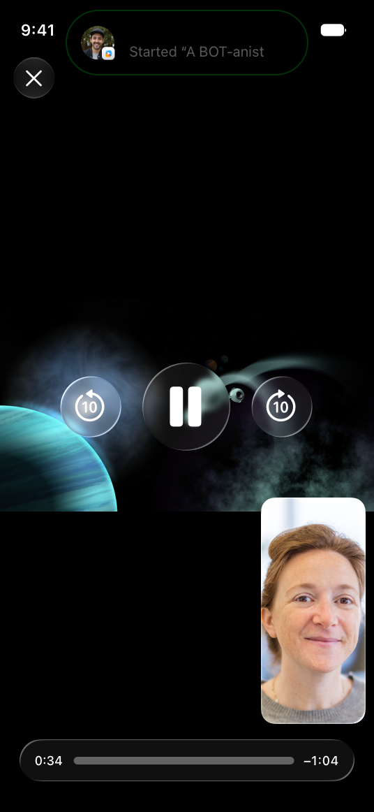 The same shared video playing on the iPhone of the person who started the SharePlay activity. A banner at the top confirms the activity they started, and a video thumbnail of the other participant appears in the lower-right corner.