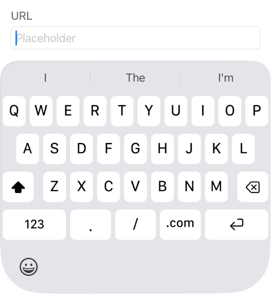 A partial screenshot of a keyboard on iPhone that displays all 26 letter keys in addition to the Shift, Delete, Numbers, period, slash, dot com, and Return keys. Typing suggestions appear above the keyboard and the Emoji button appears below it.