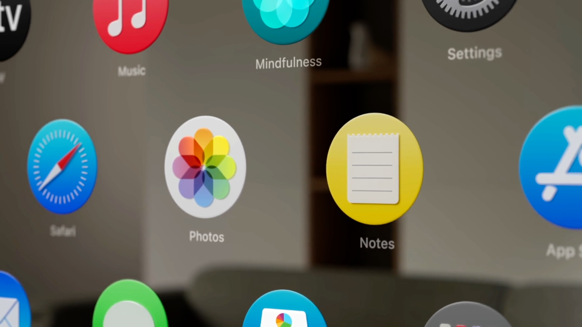 An animation of the Photos app icon in visionOS moving to show the parallax effect.