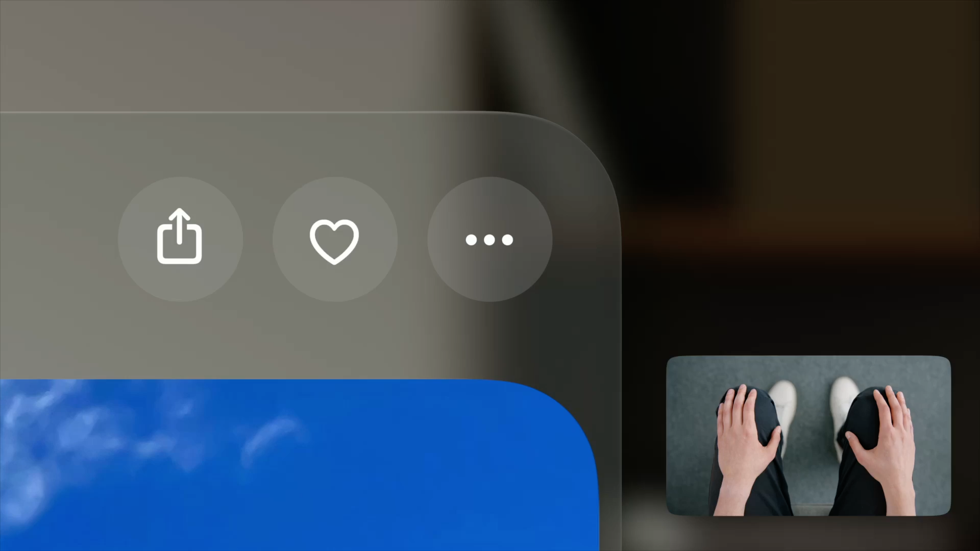 A recording showing a closeup view of the top portion of a window in visionOS. A button in the window becomes highlighted. A picture-in-picture window is visible in the bottom-right corner of the recording. It shows a person's hand performing the indirect tap gesture. In response to the gesture, the highlighted button in the window activates.