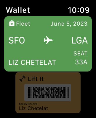 A screenshot of a selected flight pass in a list of passes on Apple Watch. The pass includes information about a flight from SFO to LGA. The next pass in the list is a gym membership card with a barcode.
